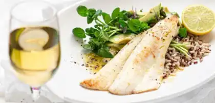 Wijtingfilets met een saus van witte wijn